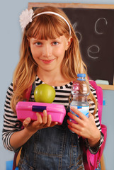 schoolgirl with lunch box