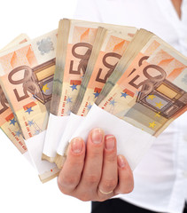 Euro stacks in woman hand