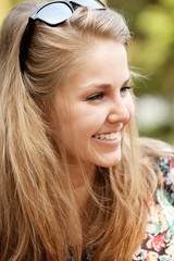 Closeup portrait of a happy young women smiling