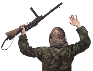 A camouflaged guerrilla warrior screaming for war.