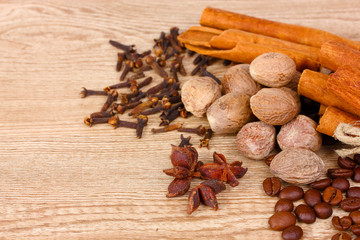 cinnamon and coffee on wooden background