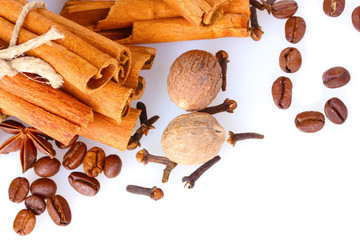 cinnamon, coffee and nutmeg isolated on white