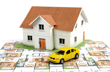 Model house,car and blueprint
