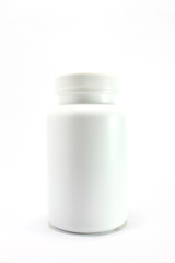 white pill bottle on white background