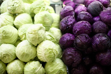 Fototapeta na wymiar Heads of cabbage at a market.