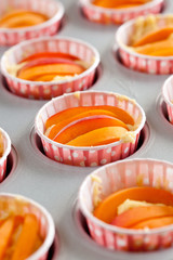 Obraz na płótnie Canvas Apricot cupcakes ready to be baked