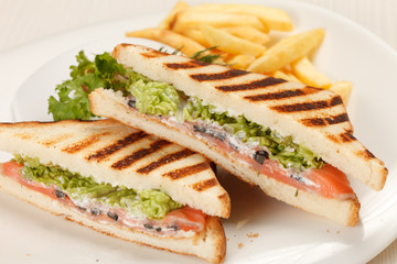 Sandwiches with French fried potatoes