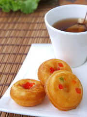 donuts with tea in background
