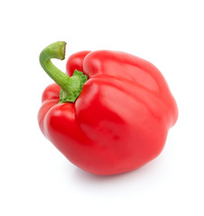 Bright red pepper closeup on a white background .