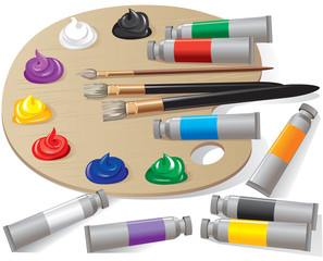 Wooden palette with paints and brushes