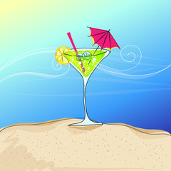 Cute cocktail glass on summer seashore
