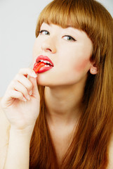 Fototapeta premium eating a candy