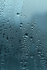 natural water drops on glass