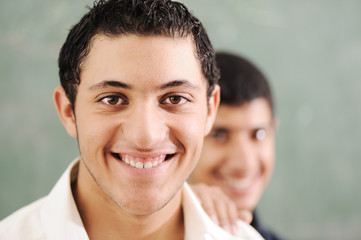 Young students at college, university classroom