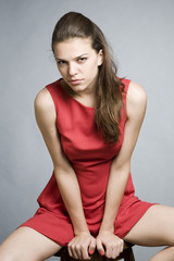 sexy female posing with red dress