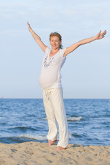 pregnant woman on beach