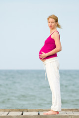 pregnant woman on beach