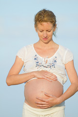pregnant woman on beach