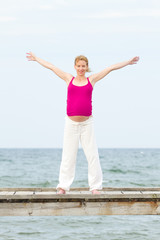 pregnant woman on beach