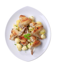 Roasted chicken wings and potatoes