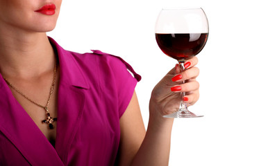 Woman holding a glass of red wine focus on the glass