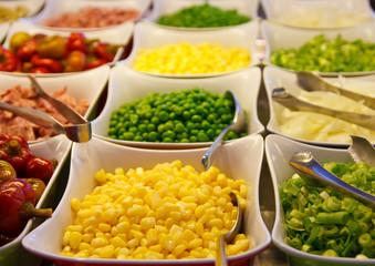 Corn and Fresh Vegetables on a Salad Bar
