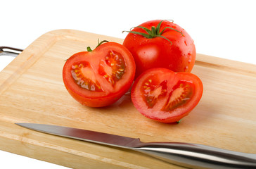 Cutting board with tomatoes