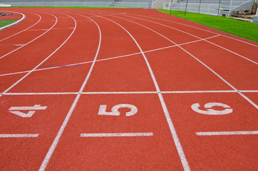 Numbered Running Track At A Sport Stadium