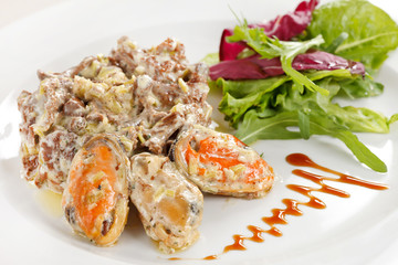 Fricassee with seafood and salad