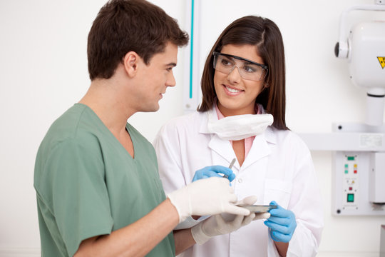 Dentist with Assistant