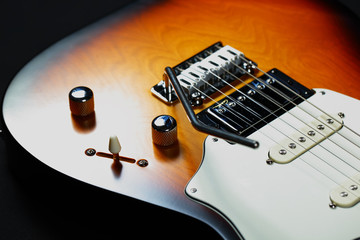 Six-string electric guitar closeup