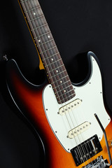 Fototapeta na wymiar Six-string electric guitar closeup