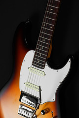 Fototapeta na wymiar Six-string electric guitar closeup