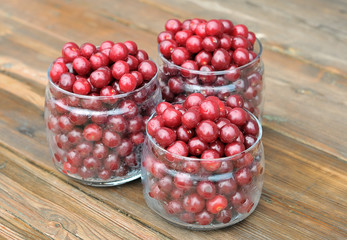 Cherries in glass jars.