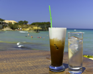 exotic beach and iced coffee