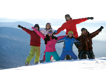 Happy snowboarding team