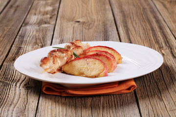Chicken skewer and apple