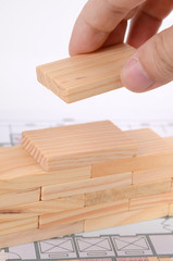 Wood bricks and blueprint