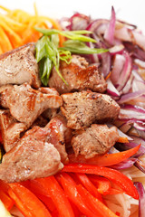 meat with vegetables and noodles