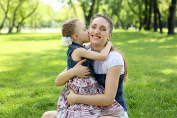 Fototapeta premium Mother with her daughter outside