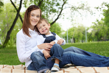 Fototapeta premium Mother with her son outside