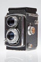Old camera left