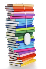 Computer mouse hanging from top of rainbow-colored book stack