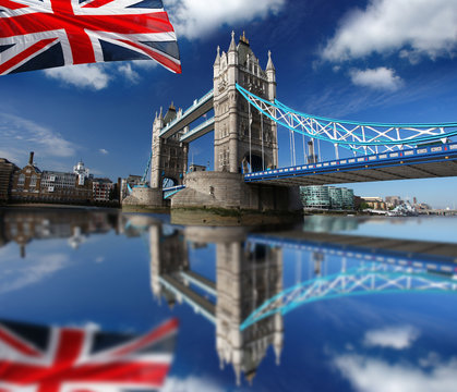 Famous Tower Bridge with flag in London, UK