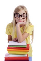 girl with funny glasses and stack of books