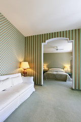 beautiful living-room and bedroom , suite in a hotel