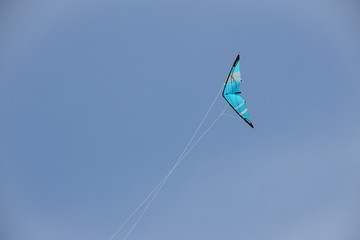 Fototapeta na wymiar Blue kite on blue sky