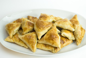 Midle Asian pies with meat, samsa on white background