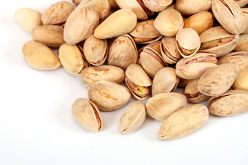 Close-up image of pistachios studio isolated on white background