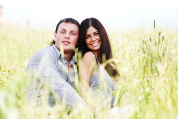 lovers on grass field